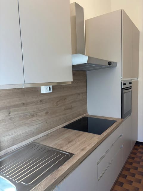 Kitchen or kitchenette, oven, stove