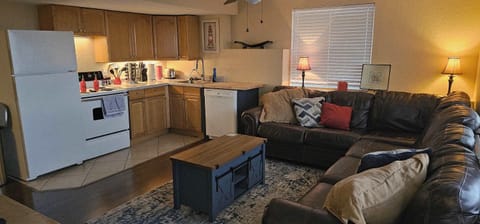 Kitchen or kitchenette, dishwasher, oven, stove