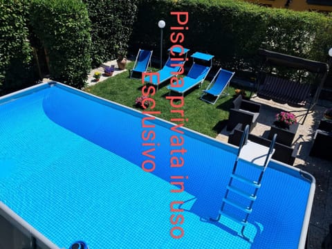 Swimming pool, sunbed