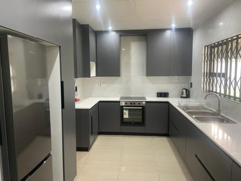 Kitchen or kitchenette, oven, stove