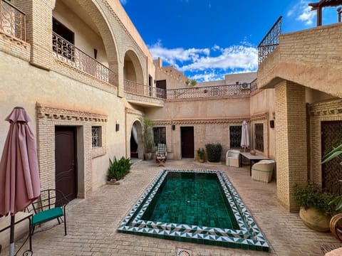 Property building, Patio, Swimming pool