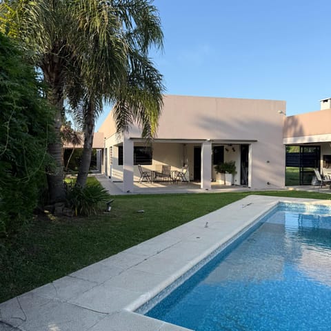 Property building, Patio, Day, Garden, Garden view, Pool view, Swimming pool, sunbed