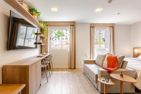 Communal lounge/ TV room, Bed, TV and multimedia, Living room, Photo of the whole room, Seating area, Bedroom