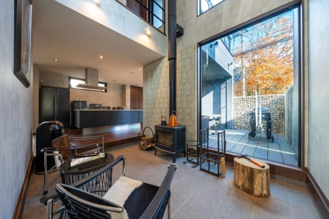 Kitchen or kitchenette, Living room, Seating area, Dining area, fireplace, fireplace