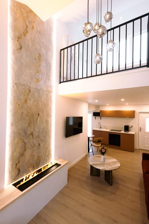 TV and multimedia, Kitchen or kitchenette, Living room, Seating area, fireplace