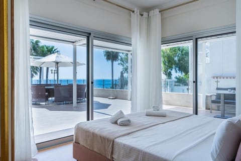 Patio, Bed, Day, Natural landscape, View (from property/room), Balcony/Terrace, Living room, Photo of the whole room, Seating area, Bedroom, Sea view, sunbed, towels