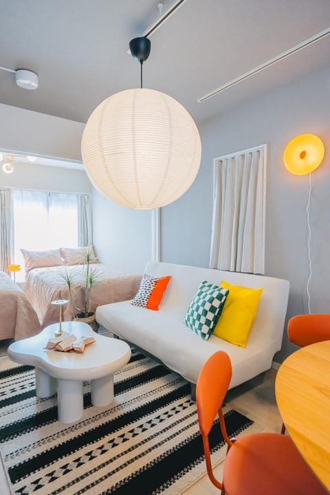Bed, Living room, Seating area, Bedroom