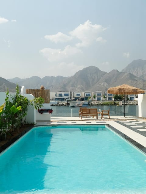 Nearby landmark, Day, Natural landscape, Beach, Mountain view, Pool view, Swimming pool, sunbed