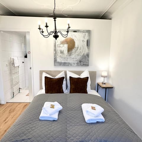 Bed, Bathroom, Living room, towels