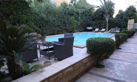Patio, Pool view, Swimming pool, sunbed
