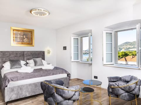 Bed, View (from property/room), Seating area, Bedroom