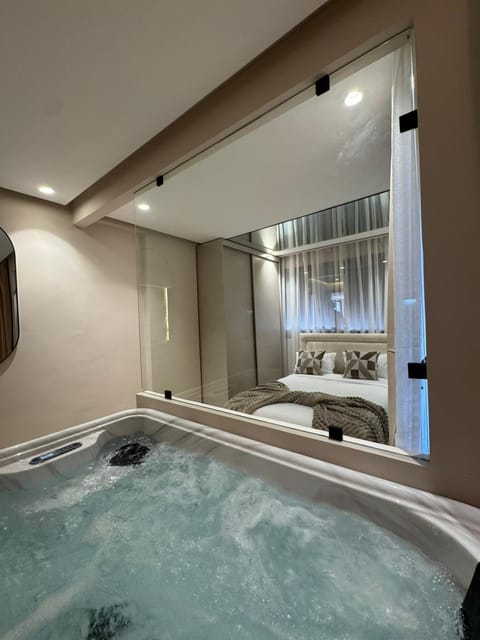 Bed, Hot Tub, Bathroom, Photo of the whole room