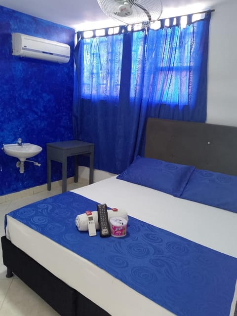 Bed, towels, air conditioner