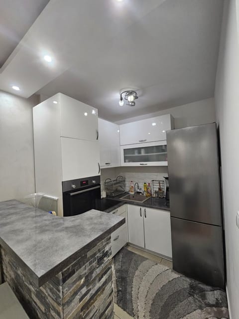 Kitchen or kitchenette, oven