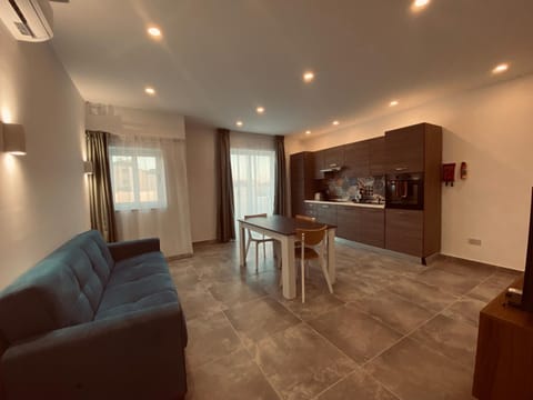 Kitchen or kitchenette, Living room, Seating area, Dining area, air conditioner