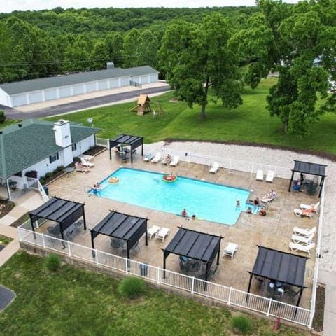 Property building, Day, Natural landscape, Pool view, Swimming pool, sunbed