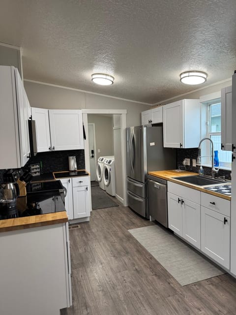 Kitchen or kitchenette, dishwasher, oven, stove, toaster