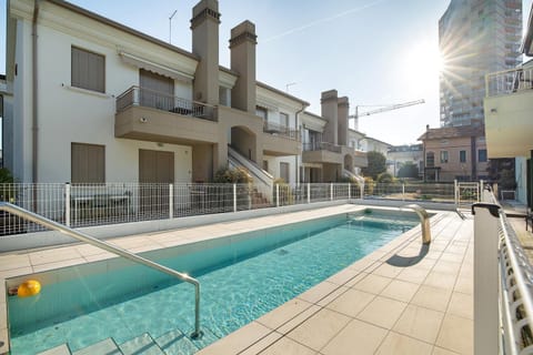 Property building, Living room, Swimming pool