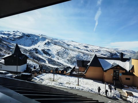 Property building, Nearby landmark, Day, Natural landscape, Winter, Mountain view