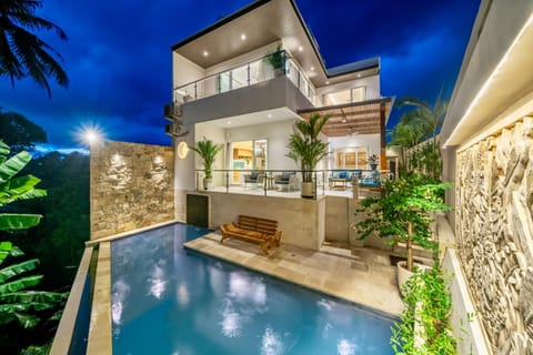 Property building, Patio, Night, View (from property/room), Balcony/Terrace, Pool view, Swimming pool, sunbed