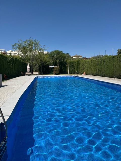 Property building, Living room, Swimming pool