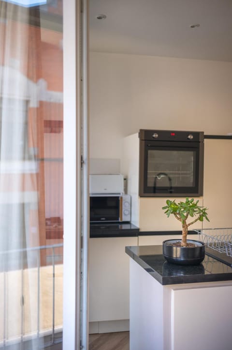 Kitchen or kitchenette, stove