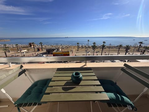 View (from property/room), Balcony/Terrace, Seating area, Beach, Sea view