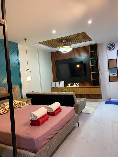 Bed, Living room, Seating area, Bedroom