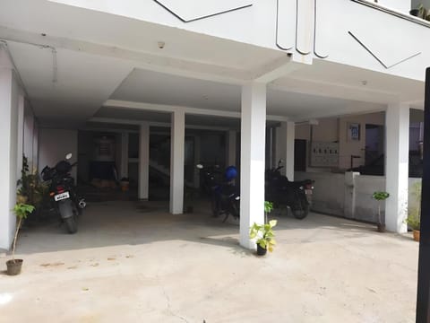 Property building, Facade/entrance, Day, Parking