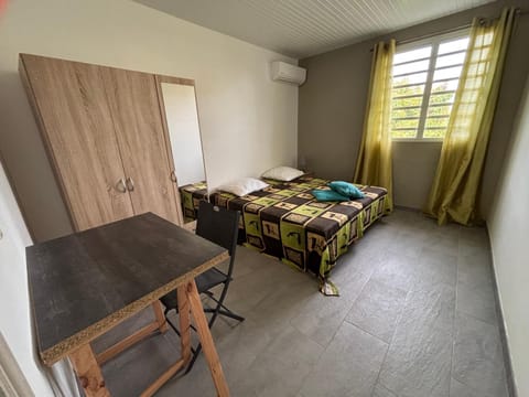 Photo of the whole room, towels, wardrobe, air conditioner
