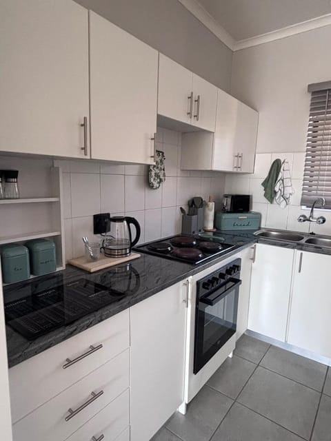 Kitchen or kitchenette, stove, toaster