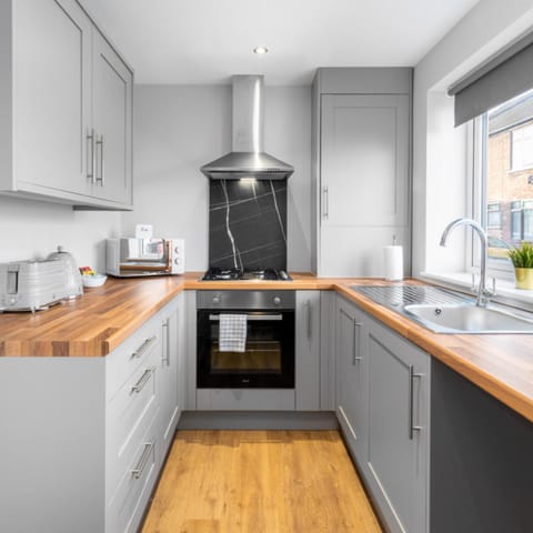 Kitchen or kitchenette, oven, stove, toaster