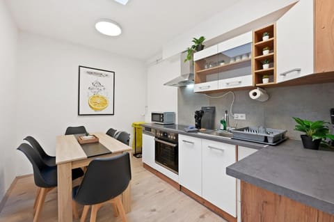 Kitchen or kitchenette, Dining area, dishwasher, oven, stove, toaster