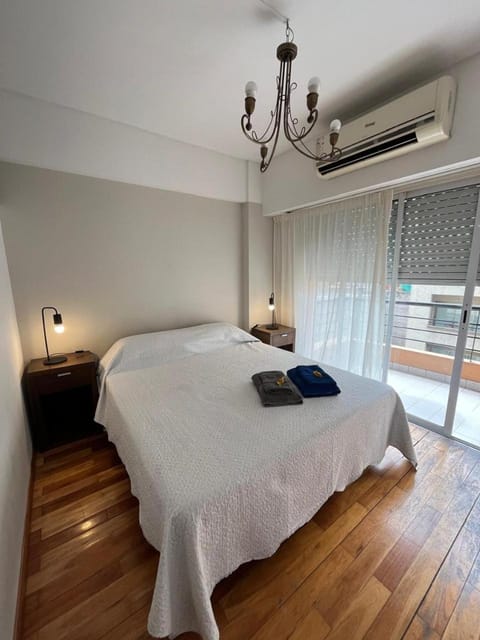 Bed, Photo of the whole room, Bedroom, towels, air conditioner