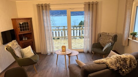 View (from property/room), View (from property/room), Living room, Seating area, Mountain view, Mountain view, Sea view, Sea view