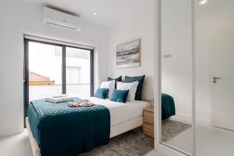 Bed, Bedroom, towels, wardrobe, air conditioner
