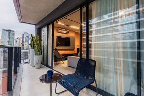 Patio, Day, Living room, Seating area, air conditioner