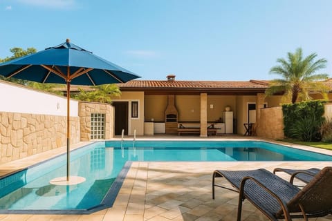 Property building, Patio, Day, Pool view, Swimming pool, sunbed