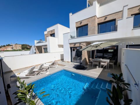 Property building, Living room, Swimming pool