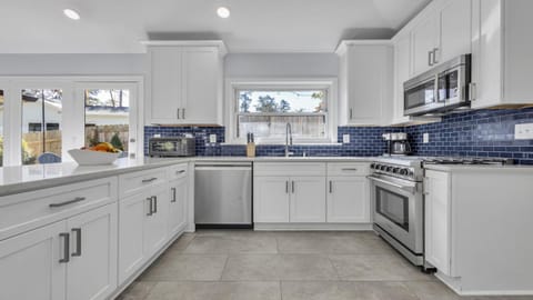 Kitchen or kitchenette, dishwasher, stove