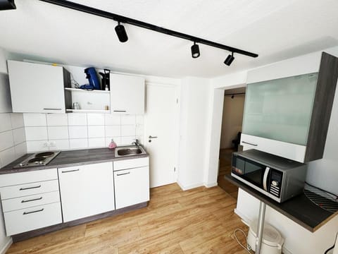 Kitchen or kitchenette, oven, stove