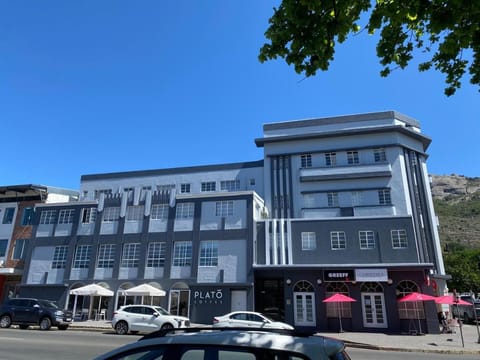 Property building, Restaurant/places to eat, Day, Neighbourhood, Location