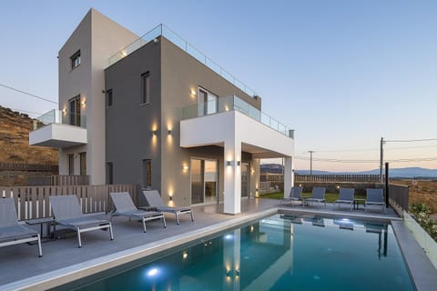 Property building, Night, Swimming pool, Swimming pool, sunbed