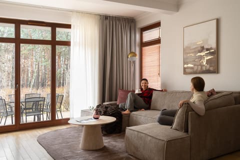 People, Living room, Seating area, Guests, group of guests