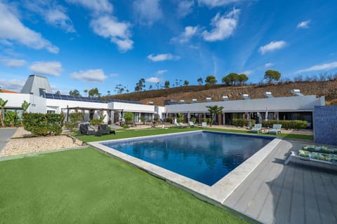 Property building, Living room, Swimming pool
