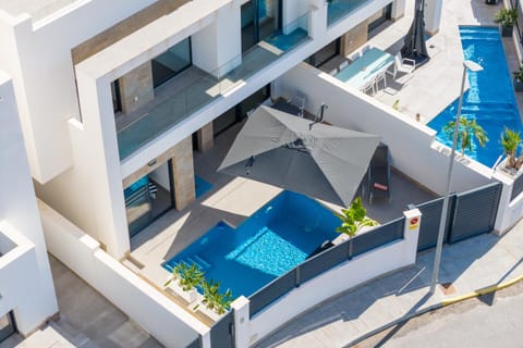 Property building, Living room, Swimming pool