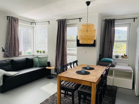 Bed, Living room, Seating area, Dining area