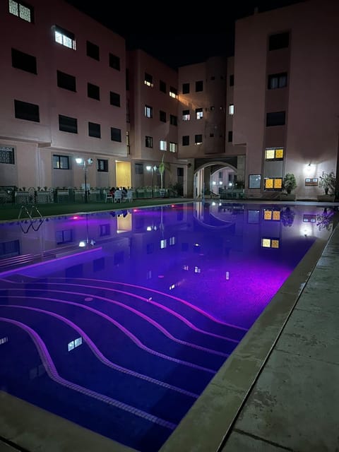 Property building, Night, Pool view, Swimming pool