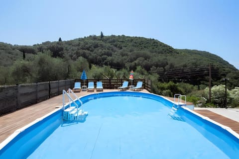 Property building, Living room, Swimming pool