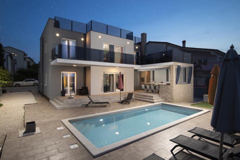Property building, Night, Swimming pool